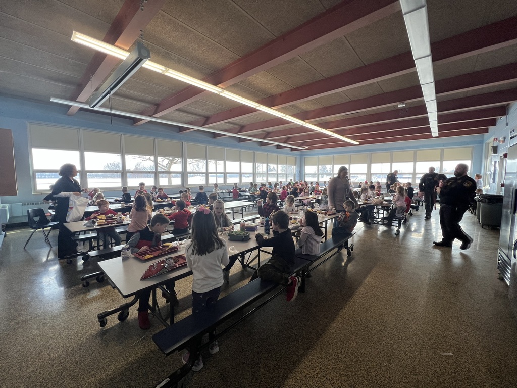 Cafeteria with students and visitors